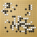 Board position at the end of game WAGC 1996 - Round 2 - Game 9: Kerem Karaerkek vs Neville Smythe