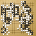 Board position at the end of game WAGC 1999 - Round 4 - Game 9: Manitra Razafindrabe vs Chin-Hwee Chua