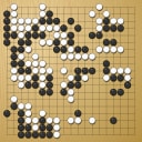 Board position at the end of game WAGC 2000 - Round 1 - Game 1: Roberto Morrison vs Say-Boon Ng