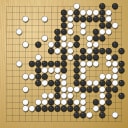 Board position at the end of game WAGC 2000 - Round 4 - Game 11: Michel Wettach vs Jean Rakotondravelo