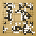 Board position at the end of game WAGC 2000 - Round 6 - Game 3: Zhenyu Zhou vs Tibor Pocsai