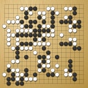 Board position at the end of game WAGC 2001 - Round 1 - Game 5: Hatime Araki vs Milos Bojanic