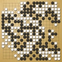 Board position at the end of game WAGC 2001 - Round 1 - Game 9: Tamar Cefarin vs Abel Rakotoarisoa