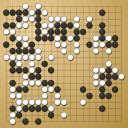 Board position at the end of game WAGC 2001 - Round 2 - Game 1: Antoine Roche vs Moriei Kanazawa