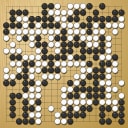 Board position at the end of game WAGC 2001 - Round 2 - Game 6: Steve Kim vs Mihai Bisca