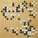 Board position at the end of game WAGC 2001 - Round 5 - Game 8: Franz Huettler vs Woei-Haw Djap
