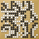 Board position at the end of game WAGC 2001 - Round 7 - Game 9: Miroslav Kostolansky vs Marco Vajani