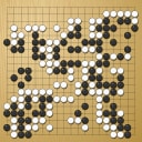 Board position at the end of game WAGC 2002 - Round 1 - Game 9: Alvaro Rittatore vs Adrian Zweig