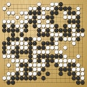 Board position at the end of game WAGC 2002 - Round 1 - Game 7: Andrius Petrauskas vs Noriyuki Yamamoto