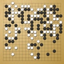 Board position at the end of game WAGC 2002 - Round 1 - Game 10: Rodrigo Caceres-Perez vs Juan-Carlos Carrillo