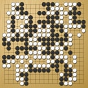 Board position at the end of game WAGC 2002 - Round 2 - Game 4: Tovonony Razafindrabe vs Steve Kim