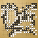 Board position at the end of game WAGC 2002 - Round 3 - Game 9: Febbiyuti Arria vs Dragan Barisic