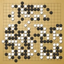 Board position at the end of game WAGC 2002 - Round 3 - Game 5: Ping-Fai Tsang vs Dmytro Bogatskyy