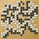 Board position at the end of game WAGC 2002 - Round 6 - Game 9: Anibal Gomez Delafuente vs Paolo Montrasio