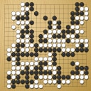 Board position at the end of game WAGC 2002 - Round 6 - Game 3: Yiming Guo vs Pong-il Ri
