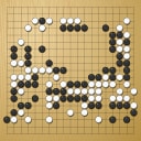 Board position at the end of game WAGC 2002 - Round 7 - Game 8: Erik Ekholm vs Kee-Soon Tiong