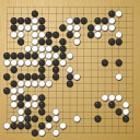 Board position at the end of game WAGC 2002 - Round 8 - Game 1: Pong-il Ri vs Li Fu