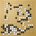 Board position at the end of game WAGC 2002 - Round 8 - Game 4: Yee-Fan Tan vs Andrius Petrauskas