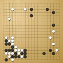 Board position at the end of game WAGC 2004 - Round 2 - Game 4: Michael Winkler vs Lucretiu Calota