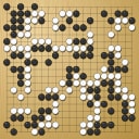 Board position at the end of game WAGC 2004 - Round 7 - Game 10: Edison Ong vs Shlomo Raikin