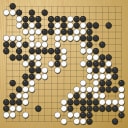Board position at the end of game WAGC 2005 - Round 5 - Game 9: Martin Li vs Roman Pozaroszczyk