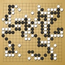 Board position at the end of game WAGC 2005 - Round 7 - Game 7: Andres Aguilar vs Andrius Petrauskas