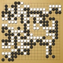 Board position at the end of game WAGC 2008 - Round 3 - Game 2: Mozheng Guan vs Fernando Aguilar