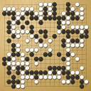 Board position at the end of game WAGC 2009 - Round 6 - Game 5: Dimas Cabre vs Wei He