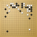 Board position at the end of game WAGC 2010 - Round 5 - Game 3: Yohei Sato vs Fernando Aguilar