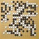 Board position at the end of game WAGC 2011 - Round 1 - Game 1: Choltit Rattanasetyut vs Salvador Larios