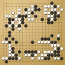 Board position at the end of game WAGC 2011 - Round 3 - Game 1: Cornel Burzo vs Baoxiang Bai