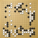 Board position at the end of game WAGC 2014 - Round 1 - Game 6: Yongfei Ge vs Andrius Petrauskas