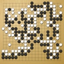 Board position at the end of game WAGC 2014 - Round 2 - Game 2: Yongfei Ge vs Tae-Woong Wei