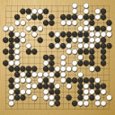 Board position at the end of game WAGC 2014 - Round 3 - Game 3: Bohdan Zhurakovskyi vs Nhat-Minh Vo