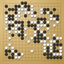 Board position at the end of game WAGC 2023 - Round 4 - Game 5: Karl Irwin vs Amir Fragman